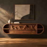 Pill shaped floating cabinet with carved mountain front and open end cubbies in a dark studio against a charcoal plaster wall