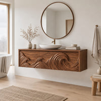 Floating cabinet with ocean wave relief carved across three fronts in a Scandinavian bathroom with white walls