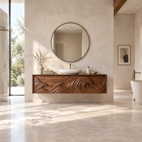 Floating cabinet with ocean wave relief carved across three fronts in a bright open plan bathroom