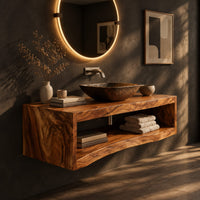 Floating wooden bathroom vanity with a slab top and an open shelf below, three-quarter view showing the grain