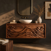 Corner detail of floating bathroom vanity with two doors carved in ocean waves beside wood, brass and linen samples