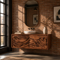 Floating bathroom vanity with two doors carved in ocean waves in an industrial loft bathroom with exposed brick