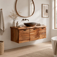 Floating wood cabinet with three doors and a live edge top in a Scandinavian bathroom with white walls