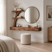 Floating makeup vanity with a low three panel front and a tree stem shelf in a Scandinavian bedroom with white walls