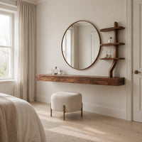 Floating wood makeup vanity with a circular mirror and a branch shaped tiered shelf in a Scandinavian bedroom with white walls