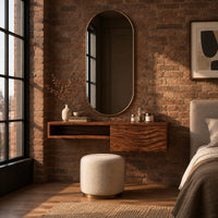 Floating makeup vanity with an open niche and a wave carved front panel in an industrial loft bedroom with exposed brick