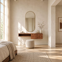 Floating makeup vanity with an open niche and a wave carved front panel in a bright open plan bedroom