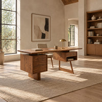 Desk with a floating top over two raised drawer cabinets in a bright open plan home office