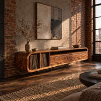 Low floating tv stand with open vinyl slots and two wide front panels in an industrial loft living room with exposed brick
