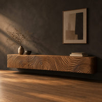 Floating tv stand with swirling tree ring carved fronts, three-quarter view showing the grain
