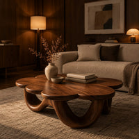 Flower shaped coffee table on a base of looping rounded arches in an evening living room with walnut wall paneling