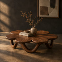 Flower shaped coffee table on a looping wave base, three-quarter view showing the grain