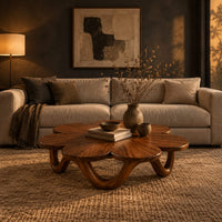 Flower shaped coffee table on a looping wave base in a dark living room at golden hour