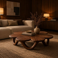 Flower shaped coffee table on a looping wave base in an evening living room with walnut wall paneling