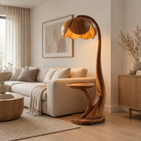 Wooden floor lamp with a flower shaped petal shade, arched stem and side tray in a Scandinavian living room with white walls