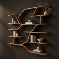 Wall shelf unit with layered plank shelves joined by flowing wave shaped ribbons, three-quarter view showing the grain