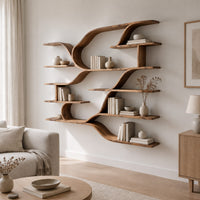 Wall shelf unit with layered plank shelves joined by flowing wave shaped ribbons in a Scandinavian living room with white walls