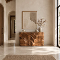 Console table cabinet with two doors carved in flowing wood grain relief in a bright open plan entryway
