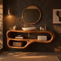 Flowing looped bathroom vanity cabinet with two open shelf bays in a dark bathroom at golden hour