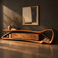 Tv stand with a flowing loop frame wrapping a wood grain center cabinet, three-quarter view showing the grain