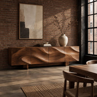 Sideboard with four flowing swirl carved panels on two block feet in an industrial loft dining room with exposed brick