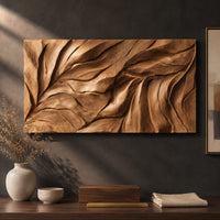 Detail of wide wall art panel carved with flowing leaf vein ridges beside wood, brass and linen samples