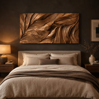 Wide wall art panel carved with flowing leaf vein ridges above a bed in a dusk lit bedroom