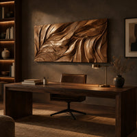 Wide wall art panel carved with flowing leaf vein ridges above a desk in a dark study corner