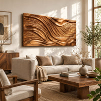 Wide wooden wall art panel with a flowing carved wave relief in a bright sunroom with green plants