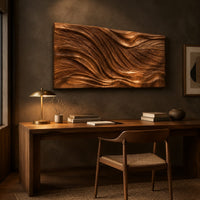 Wide wooden wall art panel with a flowing carved wave relief above a desk in a dark study corner