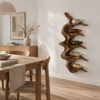 Wavy solid wood wine rack with rippling tiers shaped to cradle bottles in a Scandinavian dining room with white walls