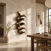 Wavy solid wood wine rack with rippling tiers shaped to cradle bottles in a bright open plan dining room