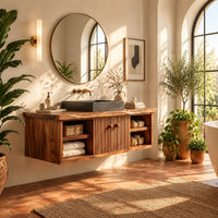 Floating vanity with fluted doors and open side shelves on both ends in a bright bathroom with arched windows and plants