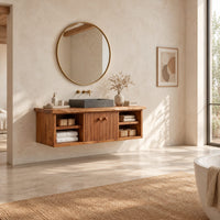 Floating vanity with fluted doors and open side shelves on both ends in a bright open plan bathroom