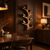 Wine rack shaped like a branching tree trunk with forked arms for bottles in an evening dining room with walnut wall paneling
