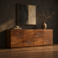 Four door sideboard with carved flowing wave lines on a plinth base, three-quarter view showing the grain