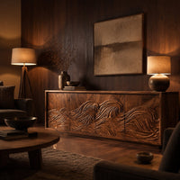 Tv stand with four doors carved with one ocean wave in an evening living room with walnut wall paneling