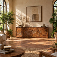 Tv stand with four doors carved with one ocean wave in a bright living room with arched windows and plants