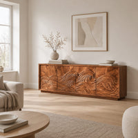 Tv stand with four doors carved with one ocean wave in a Scandinavian living room with white walls