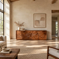 Tv stand with four doors carved with one ocean wave in a bright open plan living room