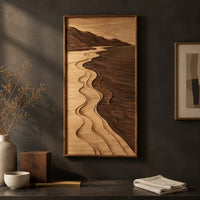 Detail of framed wall art showing a carved river landscape in light and dark wood beside wood, brass and linen samples
