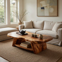 Figured wood free form coffee table with a lower shelf in an open plan space in daylight
