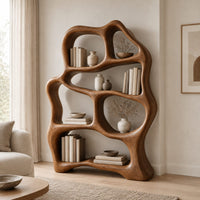Free form wooden bookshelf with soft flowing open shelves in a Scandinavian living room with white walls