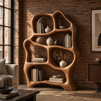 Free form wooden bookshelf with soft flowing open shelves in an industrial loft living room with exposed brick