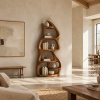 Freeform bookshelf with stacked oval cubbies in a tree trunk form in a bright open plan living room