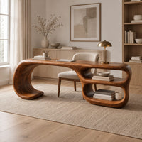 Freeform loop desk with a swooping end and stacked oval shelves in a Scandinavian home office with white walls