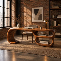 Freeform loop desk with a swooping end and stacked oval shelves in an industrial loft home office with exposed brick
