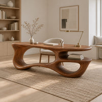 Freeform oval desk with an open loop base and a low shelf in a Scandinavian home office with white walls
