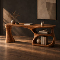 Freeform wooden desk with a flared leg and an open looped shelf base, three-quarter view showing the grain