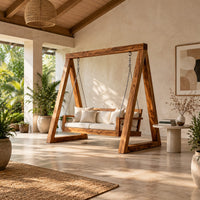 Freestanding a frame swing with a cushioned bench seat on chains in a bright open plan porch